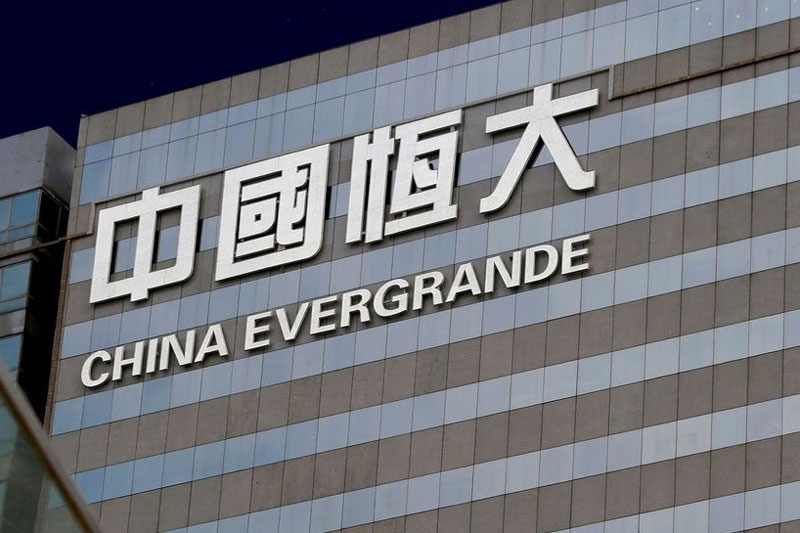 Evergrande’s shares suspended, investors await statement