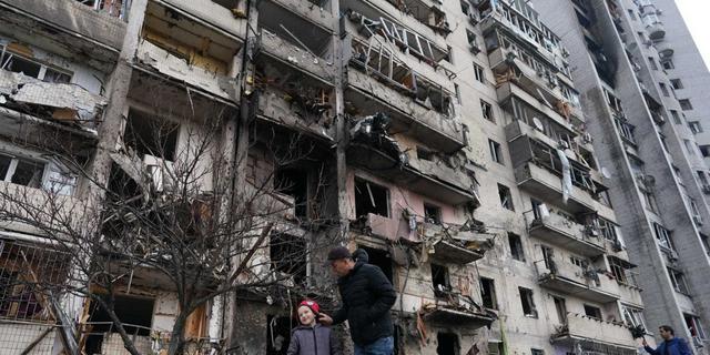 Missiles hit Kyiv as a fight for capital looms