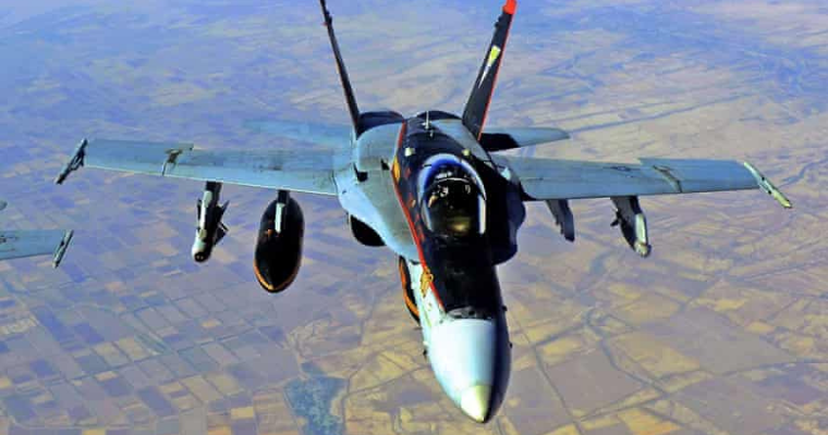 US air strikes hits Iran-backed militia amenities in Iraq and Syria
