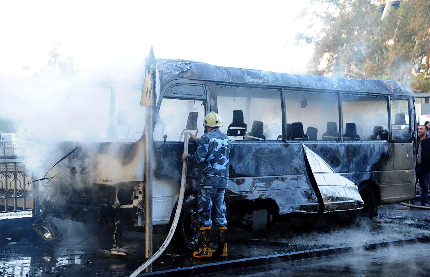 14 killed in a bomb blast on a military bus in Damascus