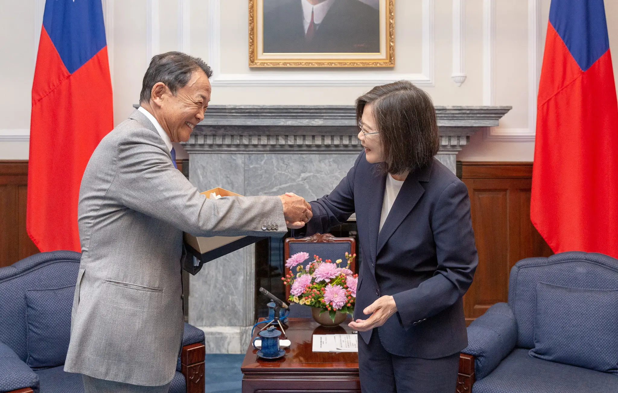 Japan’s ex PM Aso says US-Japan must show resolve to fight for Taiwan