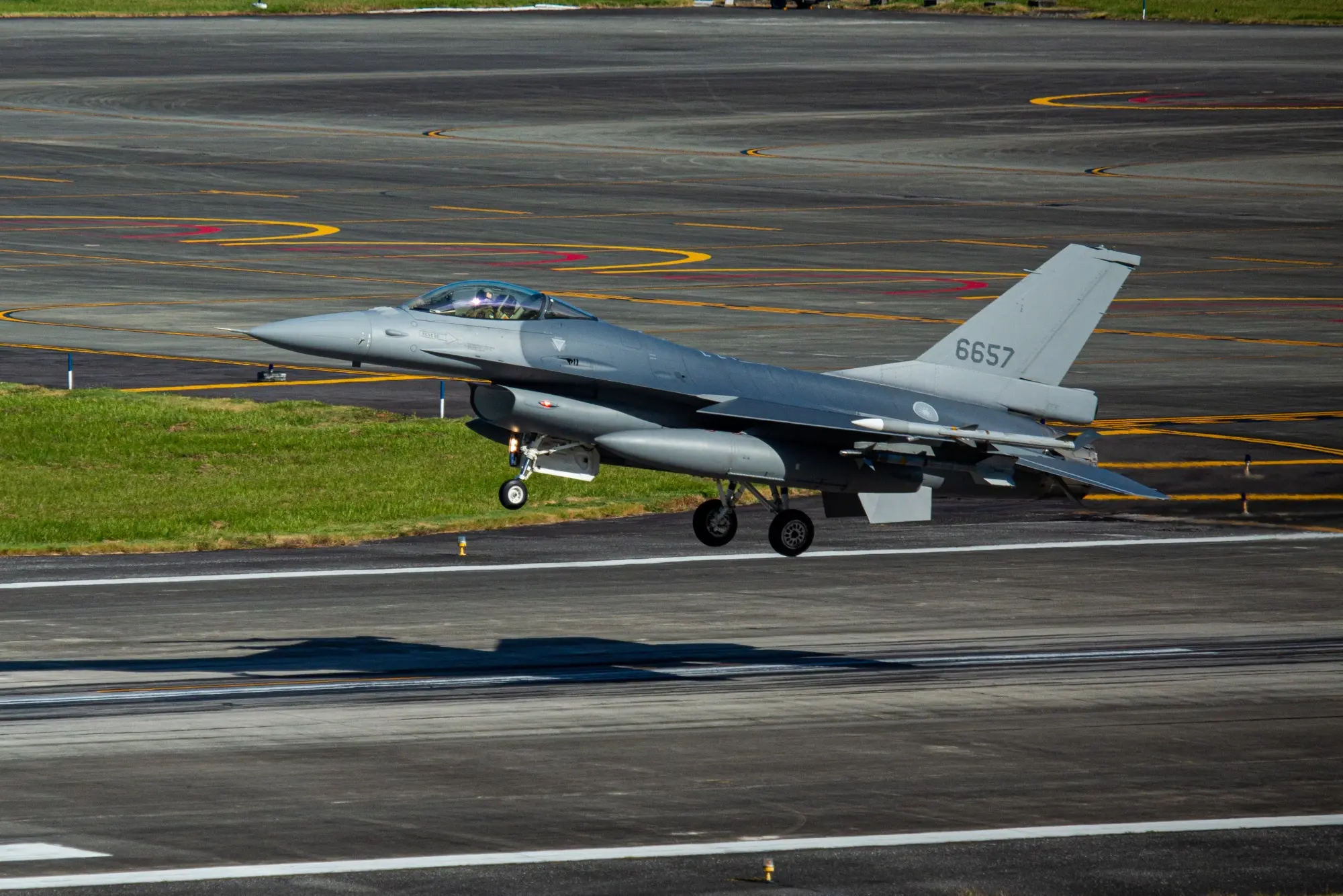 Taiwan official says delay in US arms shipment is improving
