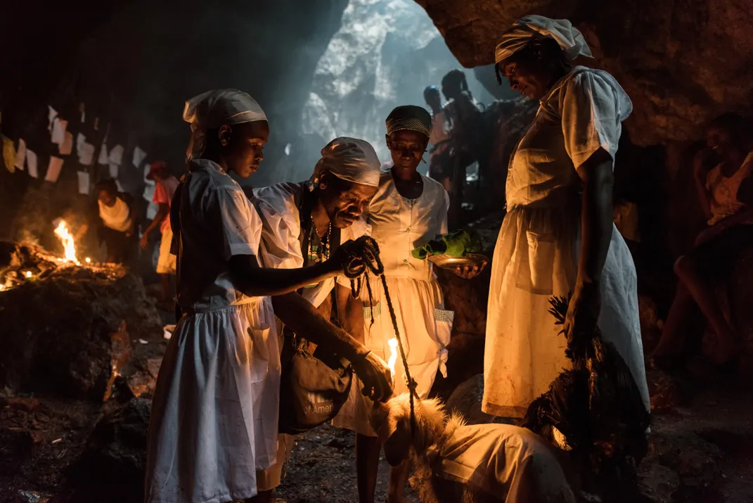 Violence in Haiti’s capital, targeting Vodou practitioners, leaves over 200 dead